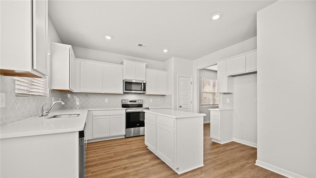 Furnished interior view inside a new home in Oakchase at Hampton, Hampton (Image 5).