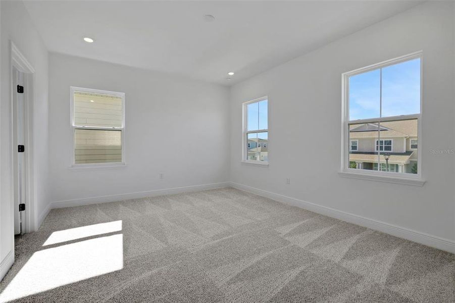 Spacious, unfurnished interior of a new home in Serenade at Ovation, Winter Garden (Image 29). Spacious, unfurnished interior of a new home in Serenade at Ovation, Winter Garden (Image 29).