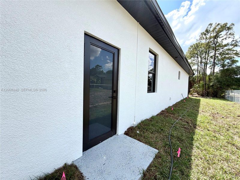 Exterior details and patio area of a home in , Naples (Image 25).