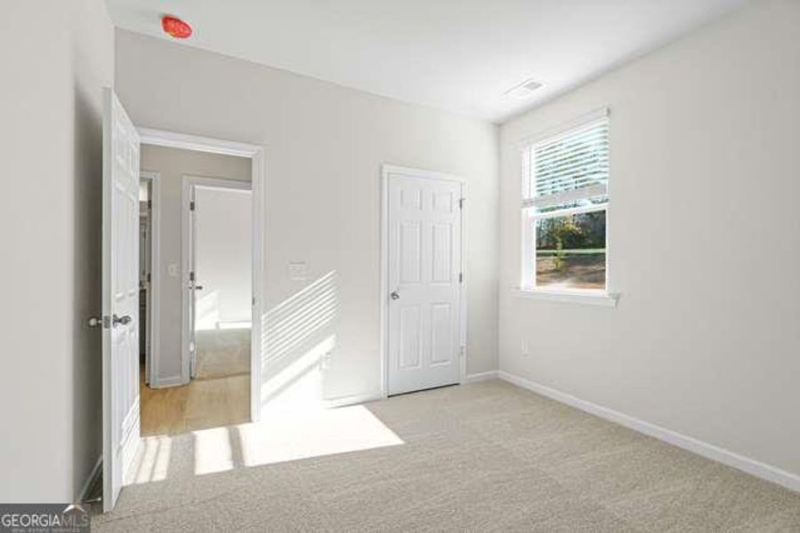 Spacious, unfurnished interior of a new home in Wehunt Meadows, Hoschton (Image 13).