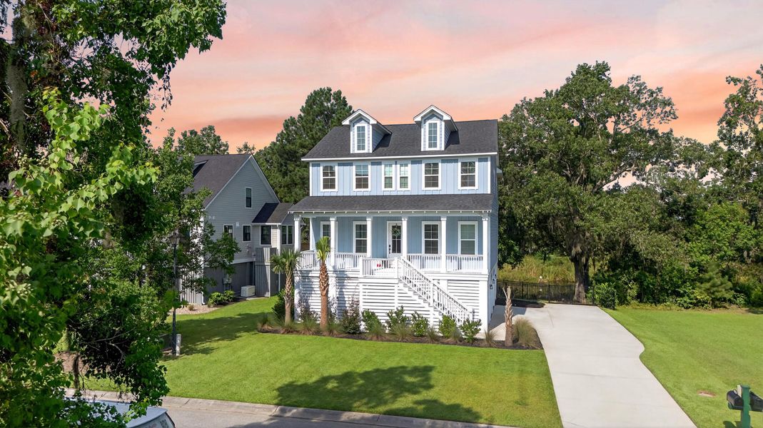 Front exterior of a new home in , Ravenel, SC, highlighting curb appeal (Image 18).