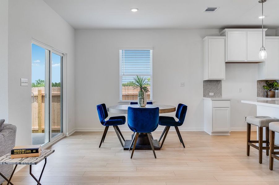 Representative furnished interior of a home built from the Sparrow by Taylor Morrison in Turner's Crossing 50s, Austin (Image 9).