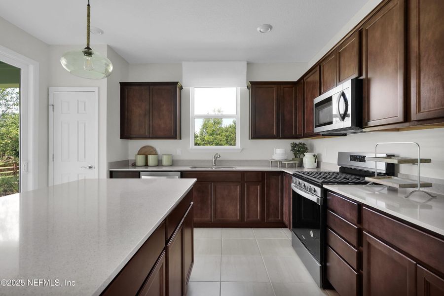Furnished interior view inside a new home in Del Webb Wildlight, Yulee (Image 6).