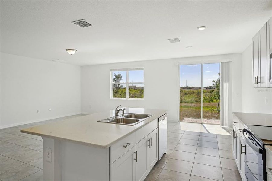 Furnished interior view inside a new home in Lake Deer Estates - Signature Series, Poinciana (Image 7). Furnished interior view inside a new home in Lake Deer Estates - Signature Series, Poinciana (Image 7).