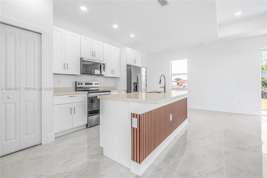 Furnished interior view inside a new home in , Lehigh Acres (Image 5).