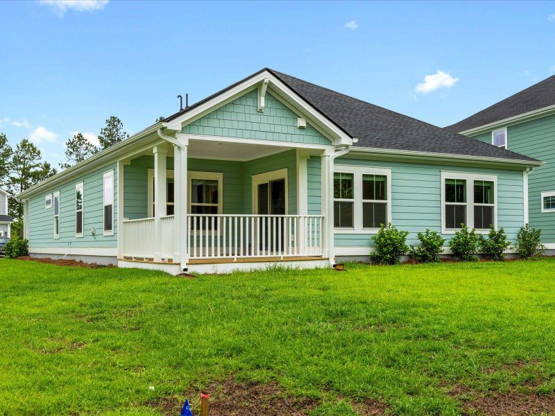 Exterior details and patio area of a home in The Coves at Lakes of Cane Bay, Summerville (Image 23).
