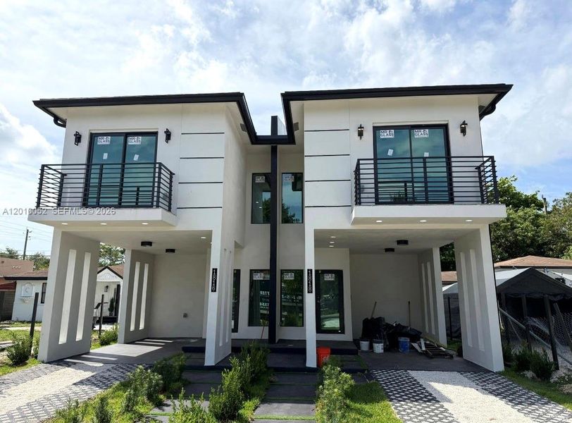 Front exterior of a new home in , Miami, FL, highlighting curb appeal (Image 2).