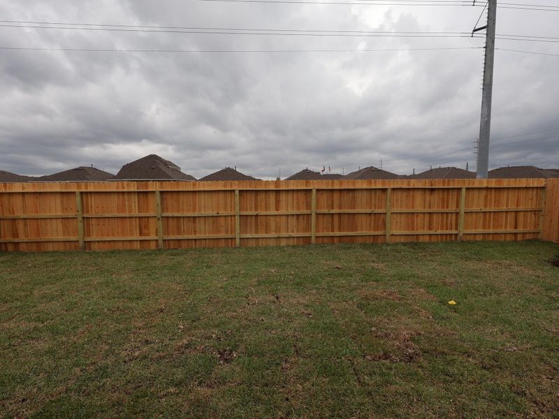 Exterior details and patio area of a home in Ambrose, La Marque (Image 3).