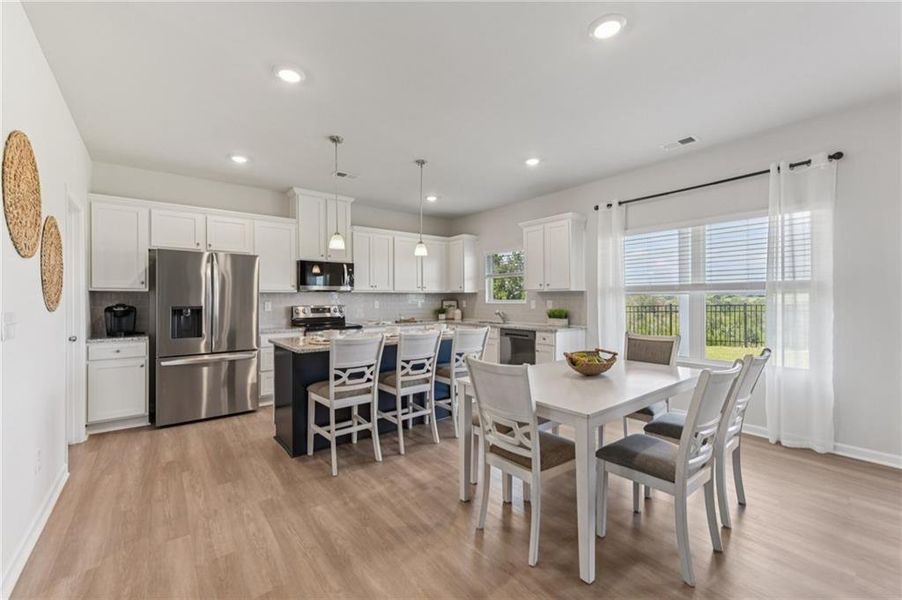 Furnished interior view inside a new home in The Hills at Cedar Creek, Winder (Image 8).