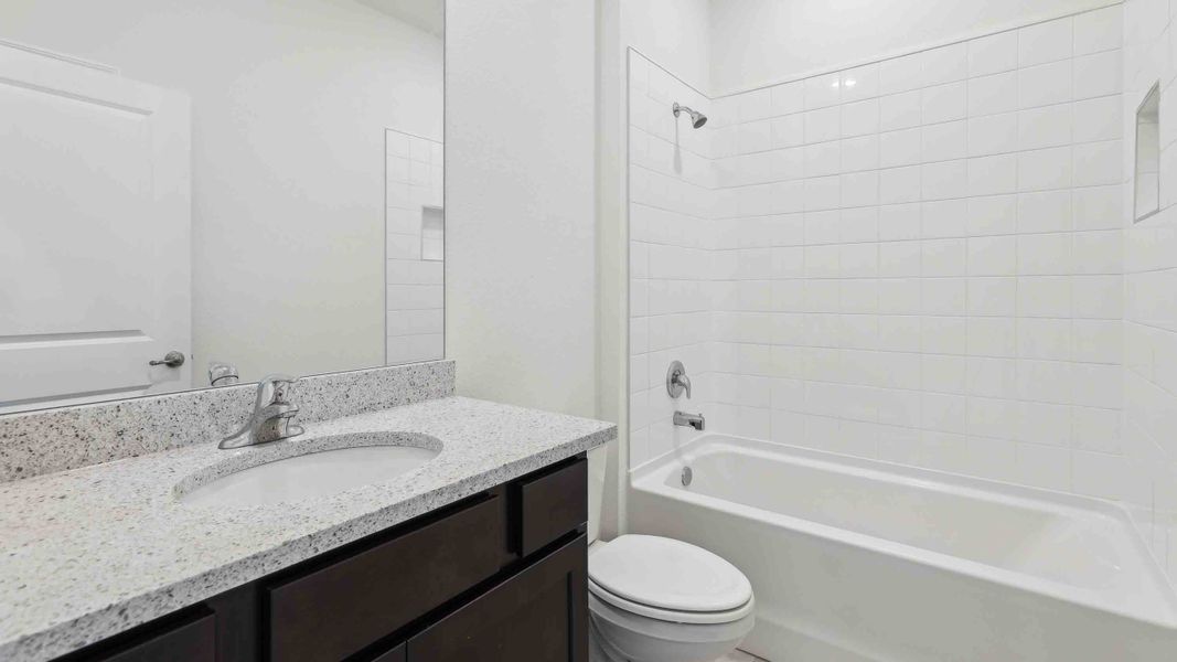 Representative furnished interior of a home built from the Laurel by D.R. Horton in Ocala Preserve, Ocala (Image 14).