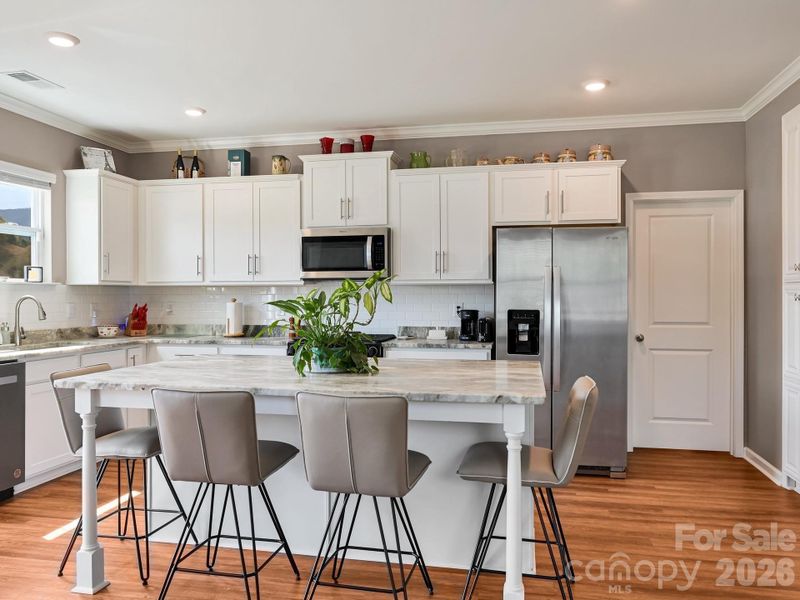 Island was Enlarged to Accomodate 4 Bar Stools