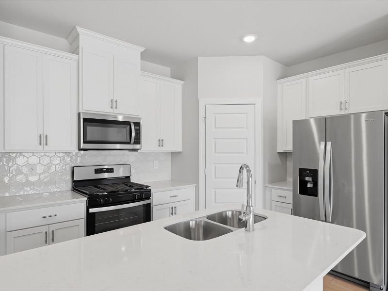 Furnished interior view inside a new home in Crossing at Abner Creek Townes, Greer (Image 6).