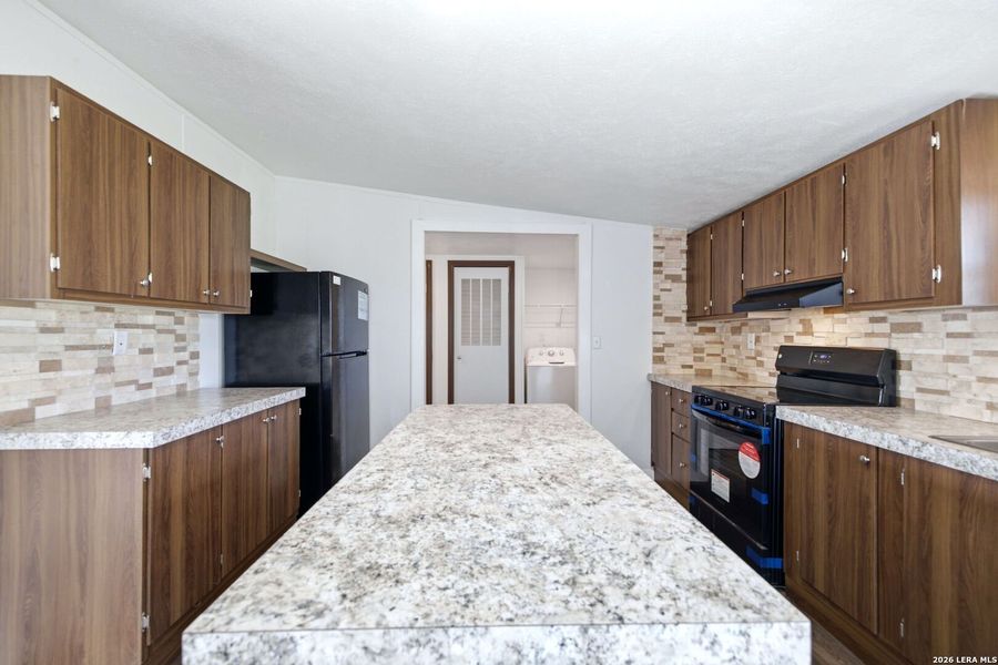 Furnished interior view inside a new home in , Atascosa (Image 7).