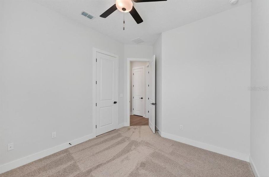 Spacious, unfurnished interior of a new home in Stables at Cary Forest, Bryceville (Image 30).