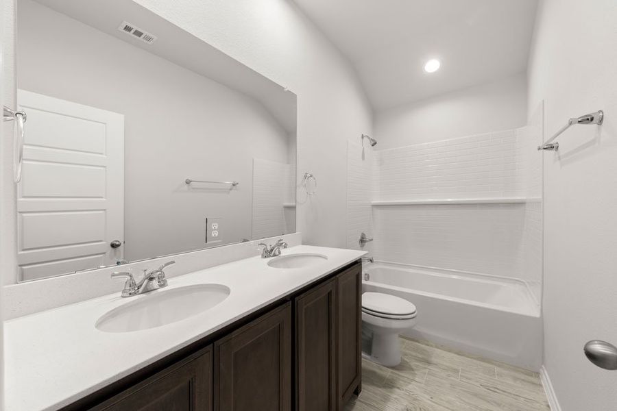 Representative exterior photo of a completed home built from the Boston by Impression Homes in Keeneland, Aubrey, TX (Image 22).