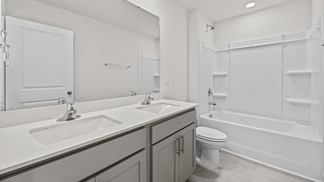 Furnished interior view inside a new home in Tyler - Home on the Lake, New Bern (Image 5). Furnished interior view inside a new home in Tyler - Home on the Lake, New Bern (Image 5).