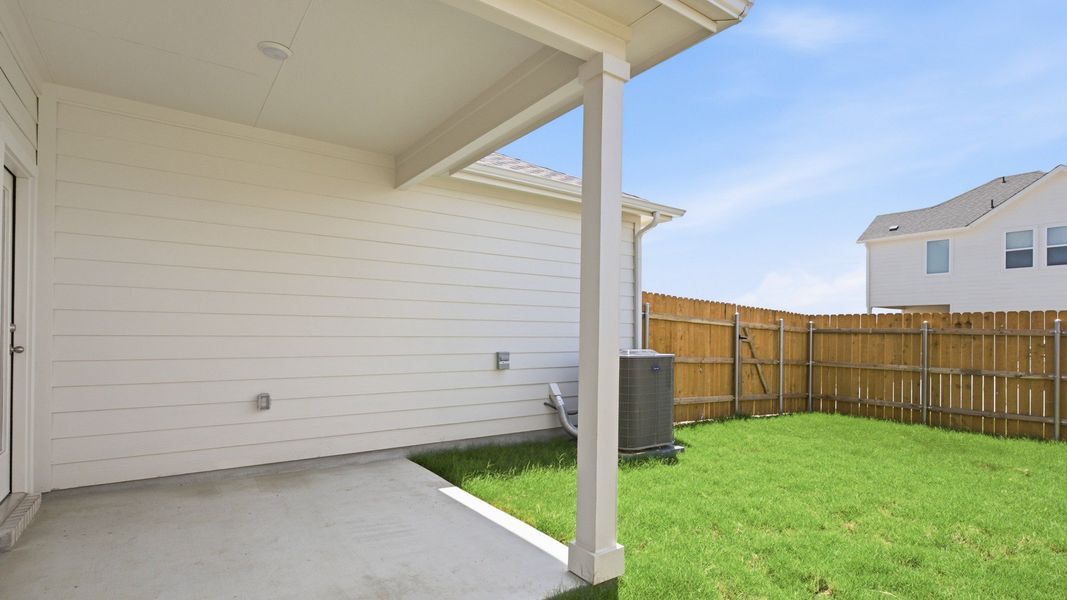 Exterior details and patio area of a home in Creeks Crossing, Elgin (Image 21). Exterior details and patio area of a home in Creeks Crossing, Elgin (Image 21).
