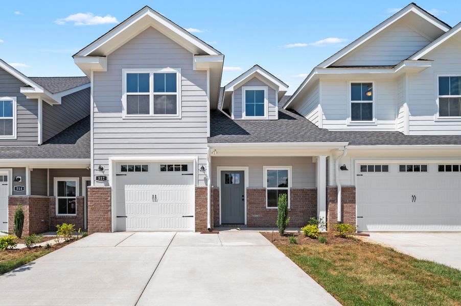 Front exterior of a new home in Saddlebrook, Murfreesboro, TN, highlighting curb appeal (Image 1).
