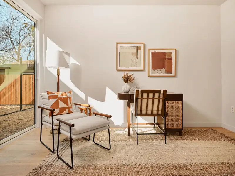 Living area featuring wood finished floors and baseboards