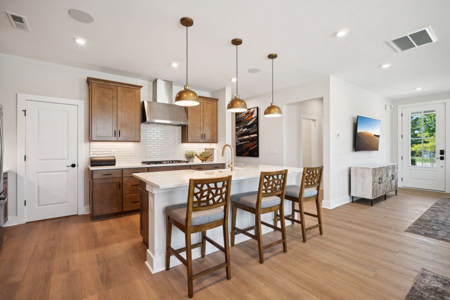 Representative furnished interior of a home built from the Torrence by Tri Pointe Homes in Seven Oaks, Belmont (Image 7).
