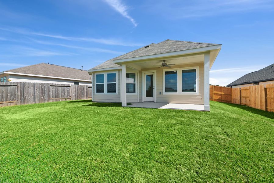 Exterior details and patio area of a home in Magnolia Ridge, Magnolia (Image 3).