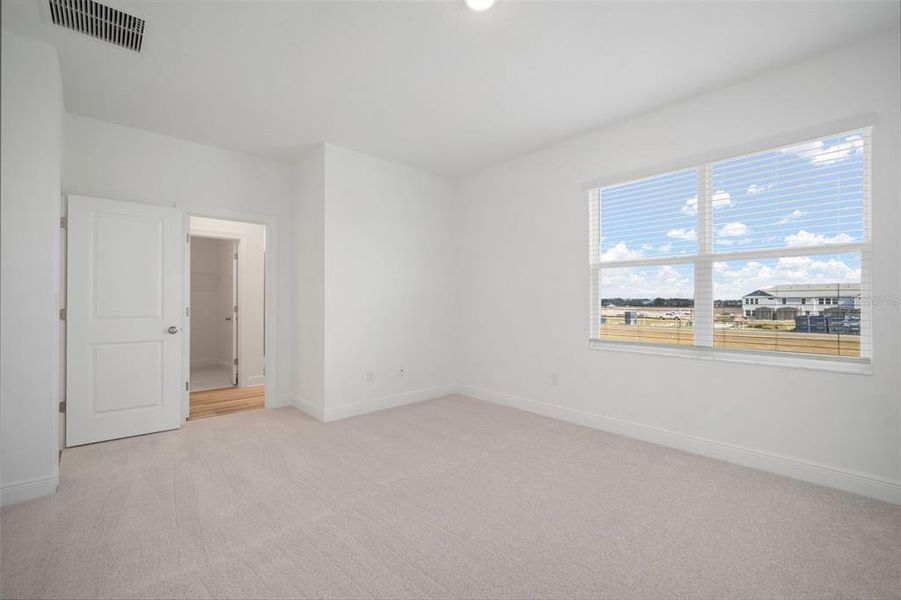 Spacious, unfurnished interior of a new home in North River Ranch, Parrish (Image 31).