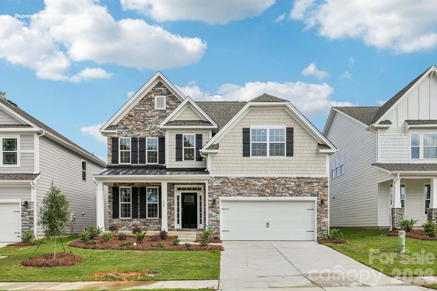 Front exterior of a new home in Brantley, Mooresville, NC, highlighting curb appeal (Image 1). Front exterior of a new home in Brantley, Mooresville, NC, highlighting curb appeal (Image 1).