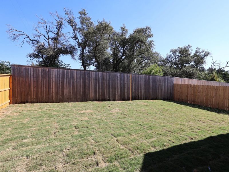 Exterior details and patio area of a home in Cedar Brook, Leander (Image 14).