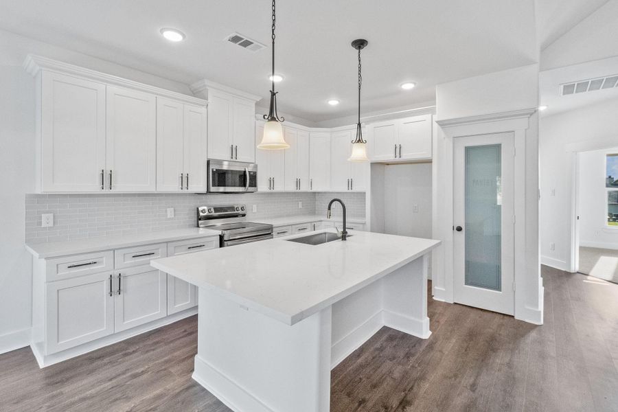Modern kitchen overlooks the living area! Modern kitchen overlooks the living area!