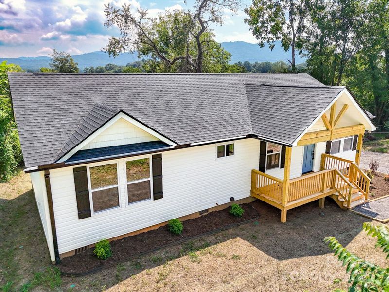 Front exterior of a new home in , Asheville, NC, highlighting curb appeal (Image 25).
