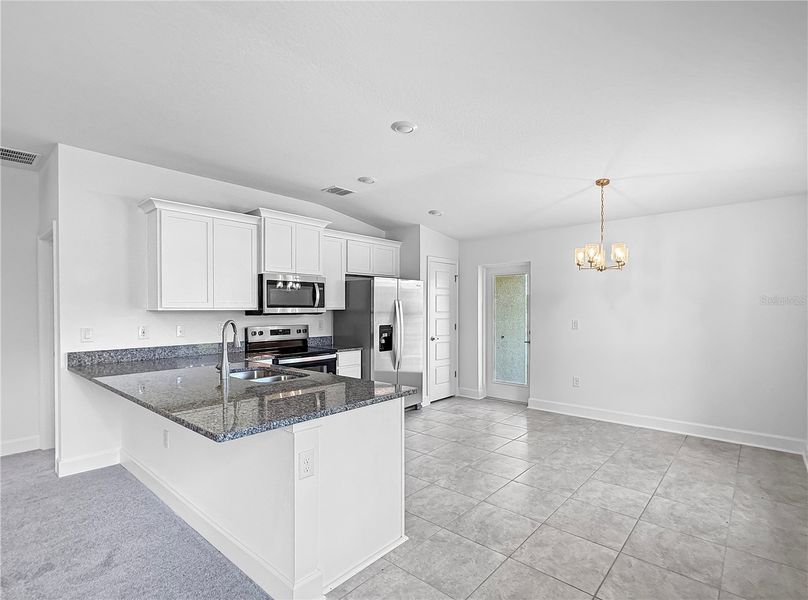 Furnished interior view inside a new home in Harmony Central, St. Cloud (Image 6).