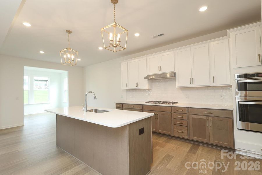 Furnished interior view inside a new home in Estates at Sugar Creek, Indian Land (Image 9).