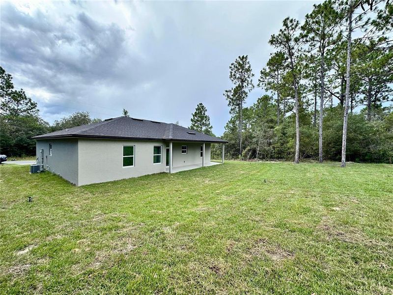 Front exterior of a new home in , Citrus Springs, FL, highlighting curb appeal (Image 16).
