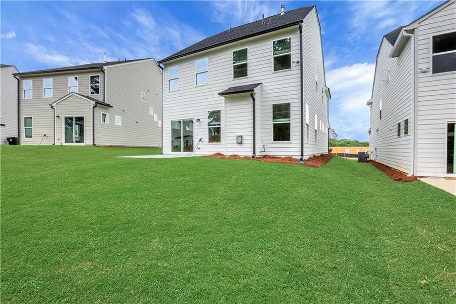 Exterior details and patio area of a home in Villas at Dawsonville, Dawsonville (Image 27).