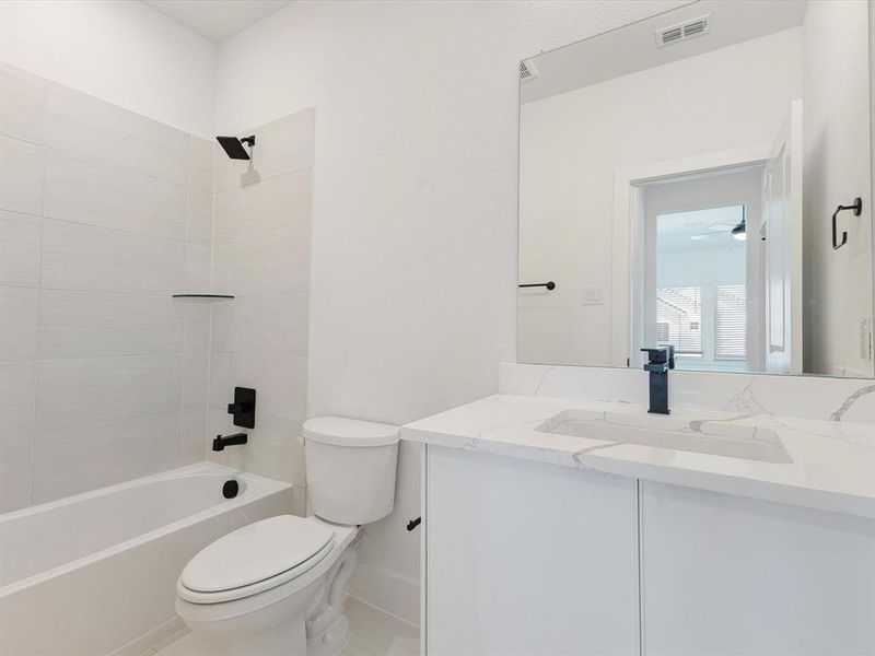 Furnished interior view inside a new home in Royal Court, Little Elm (Image 11). Furnished interior view inside a new home in Royal Court, Little Elm (Image 11).