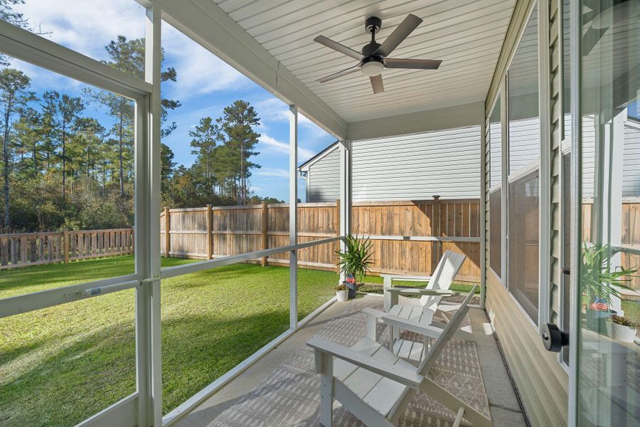 Exterior details and patio area of a home in Jasmine Point at Lakes of Cane Bay, Summerville (Image 31).