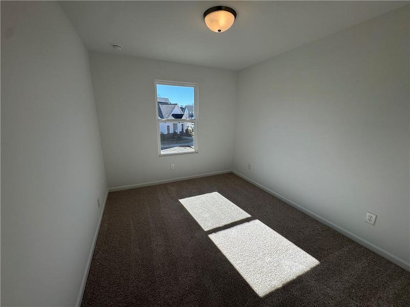 Spacious, unfurnished interior of a new home in Laurelwood, Douglasville (Image 11).