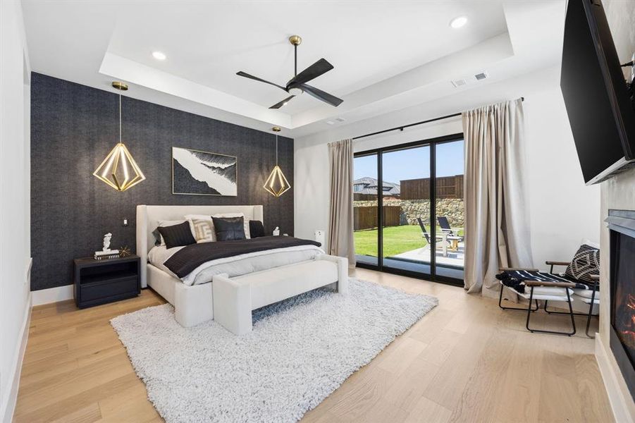 Sliders lead out to a covered patio and firepit seating area Sliders lead out to a covered patio and firepit seating area