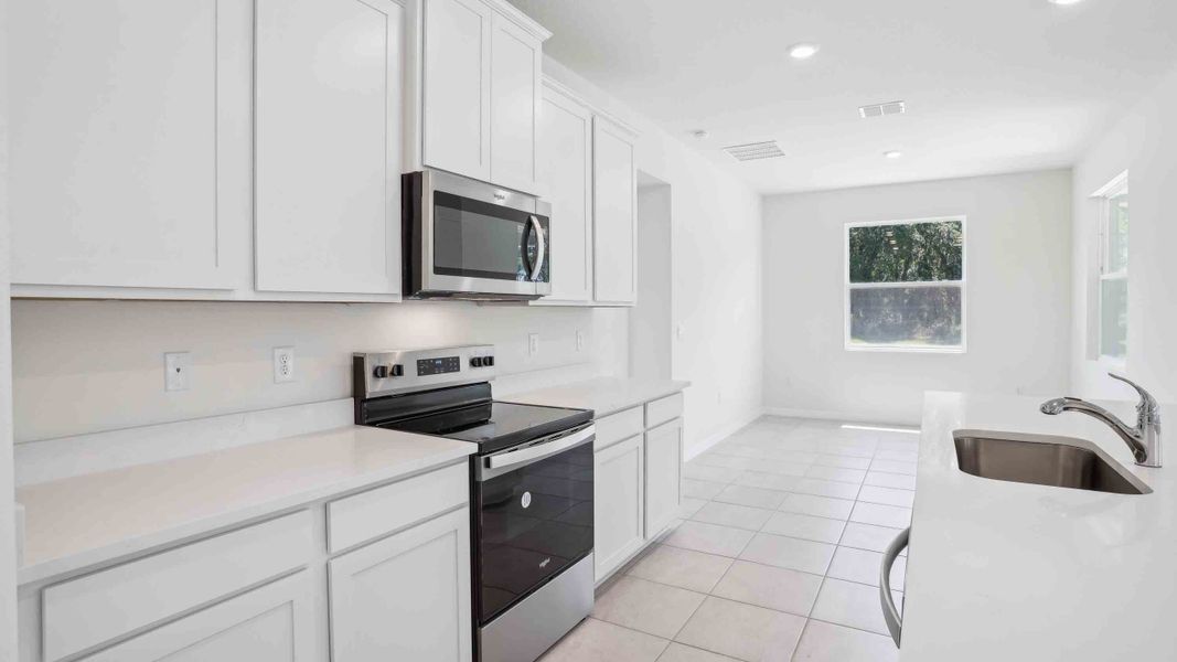 Representative furnished interior of a home built from the Camden by D.R. Horton in Ocala Preserve, Ocala (Image 9).