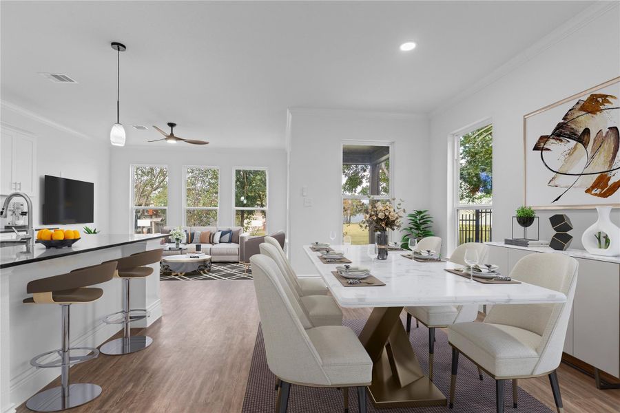 The casual dining area features tall insulated vinyl windows that fill the room with natural light while maintaining year-round comfort. A beautifully crafted custom home waiting for you to begin your next chapter! *Virtually staged* The casual dining area features tall insulated vinyl windows that fill the room with natural light while maintaining year-round comfort. A beautifully crafted custom home waiting for you to begin your next chapter! *Virtually staged*