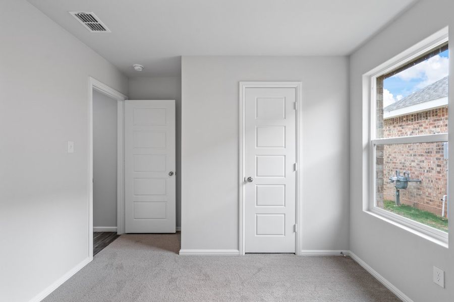 Representative unfurnished interior of a home built from the TAYLOR by D.R. Horton in Faculty Row, Abilene (Image 49).