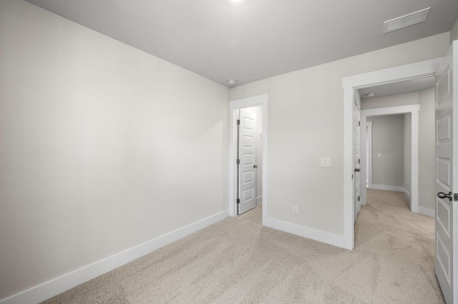 Photo is of a similar home