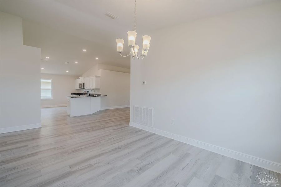 Spacious, unfurnished interior of a new home in Pine Top, Cantonment (Image 10).