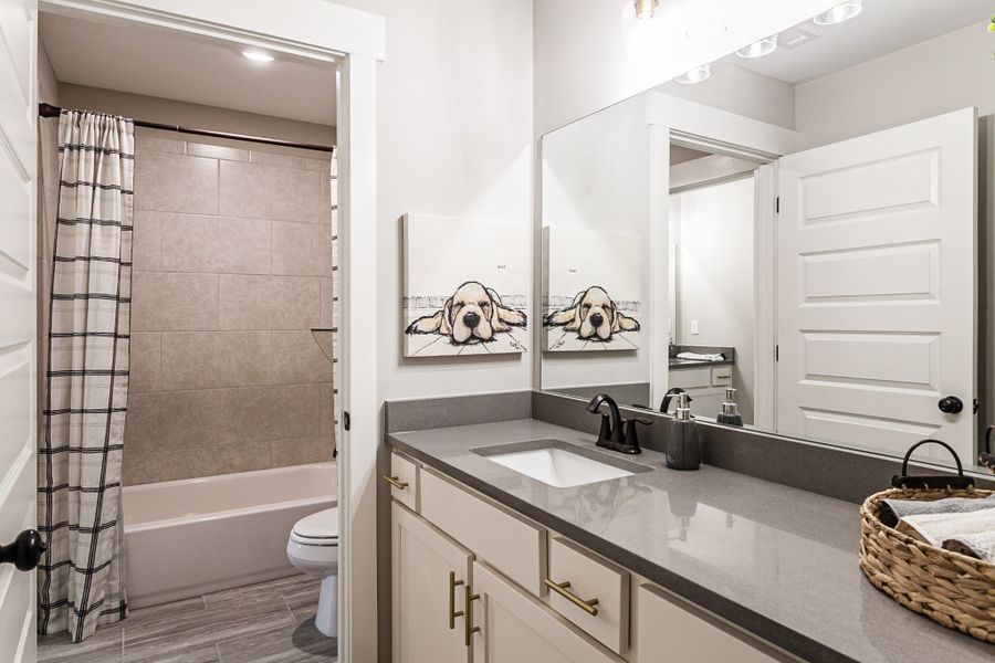 Representative furnished interior of a home built from the Bentley by Grant & Co in Manor at Hall Creek, Arlington (Image 8).