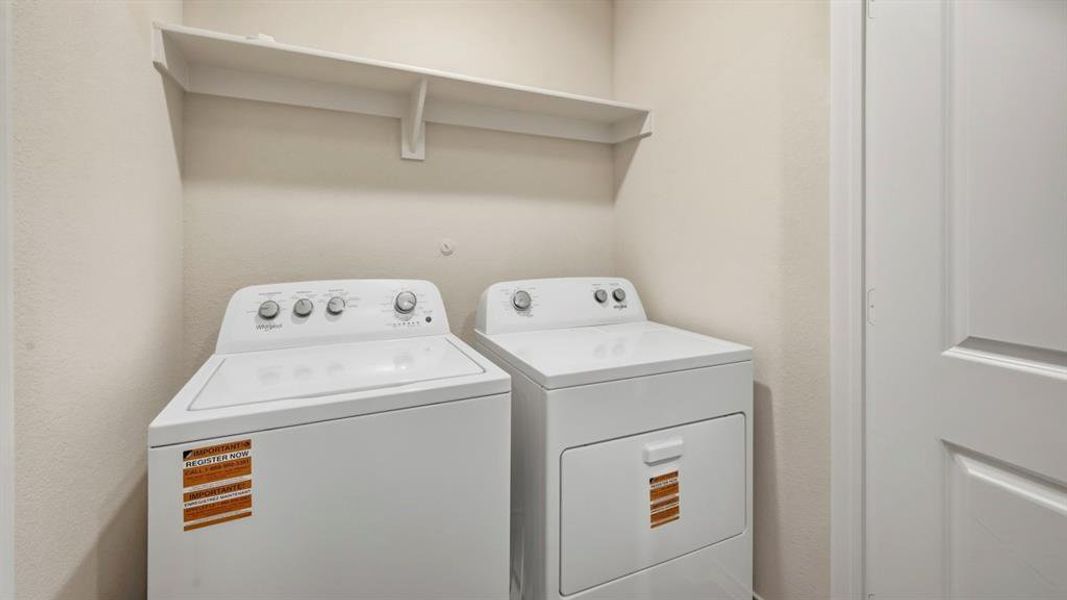 Washroom featuring independent washer and dryer