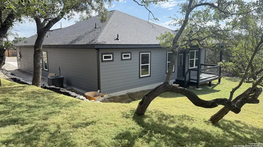 Exterior details and patio area of a home in , Spring Branch (Image 23). Exterior details and patio area of a home in , Spring Branch (Image 23).