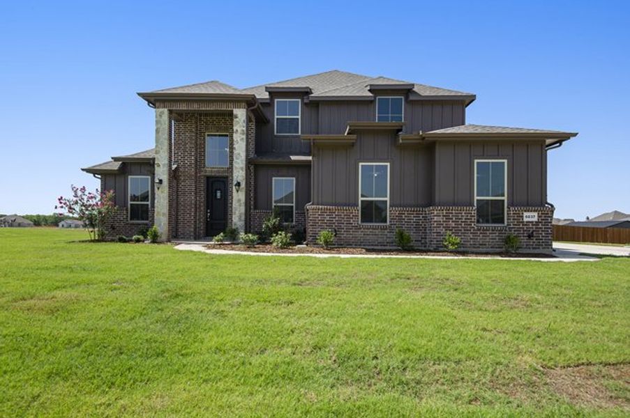 Representative exterior photo of a completed home built from the The Cottonwood by Sumeer Homes in Stone Henge II, Sanger, TX (Image 2). Representative exterior photo of a completed home built from the The Cottonwood by Sumeer Homes in Stone Henge II, Sanger, TX (Image 2).