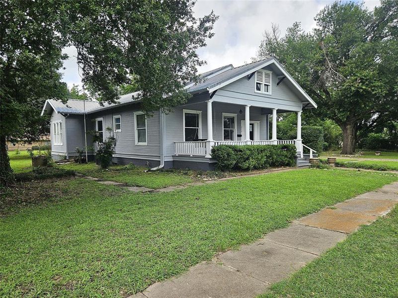 Front exterior of a new home in , Groesbeck, TX, highlighting curb appeal (Image 21).