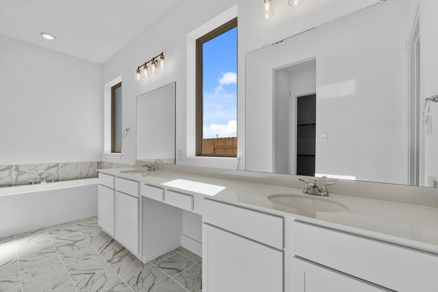 Designed as a peaceful escape within the home, this relaxing primary bath delivers the comfort, style, and everyday luxury today’s buyers love.