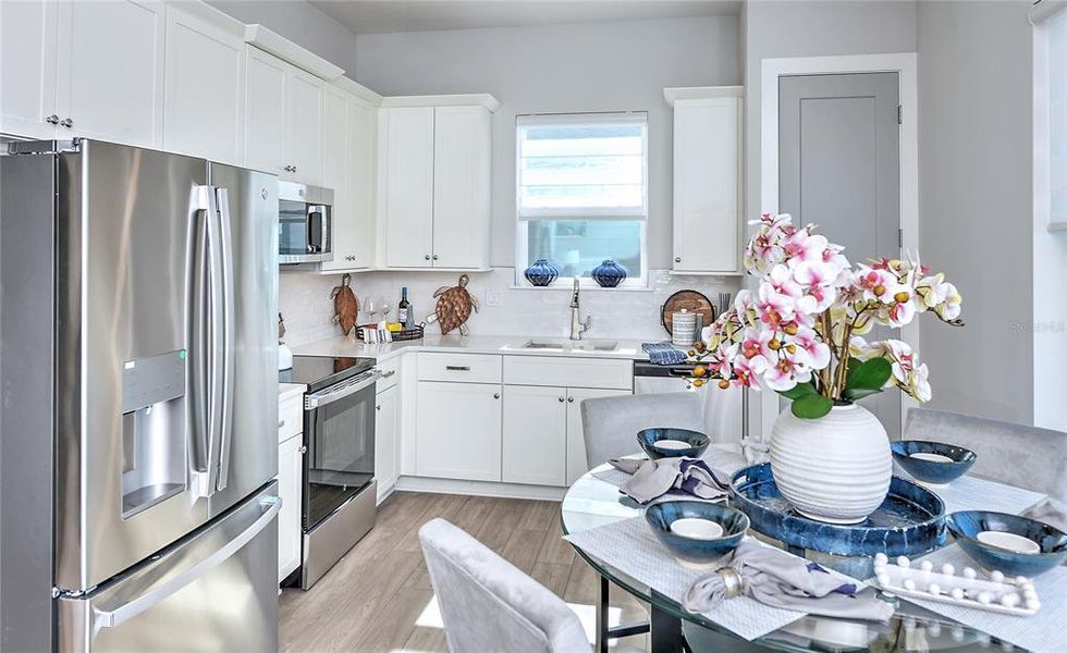 Furnished interior view inside a new home in Laureate Park, Orlando (Image 11).